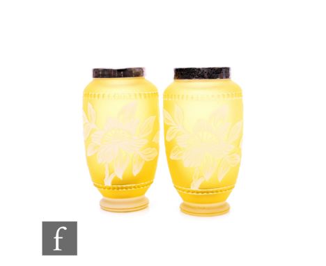 A pair of late 19th Century cameo glass vases, of elongated ovoid form with plated short drawn collar, opal over lemon cut wi