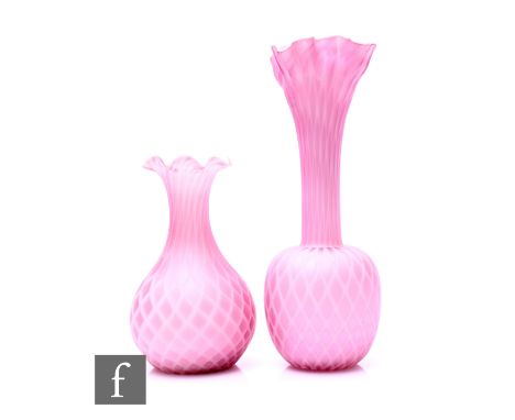 A late 19th Century quilted satin airtrap vase of globe and shaft form with high drawn frilled neck, graded amethyst over opa