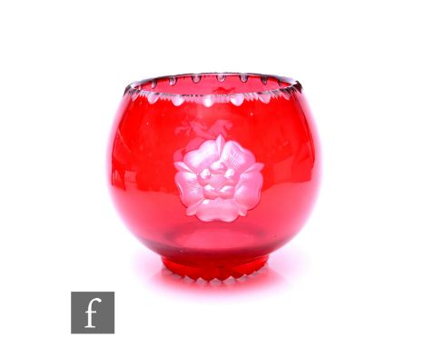 A Stevens &amp; Williams intaglio cut ruby flash glass bowl, of spherical form, engraved by Stanley Bull with George and the 