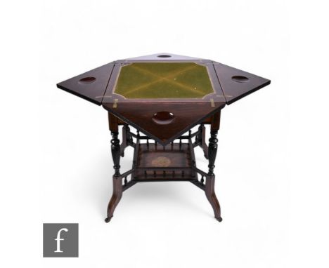 A late Victorian marquetry and ivory inlaid rosewood envelope card table on turned splayed legs united by a galleried stretch