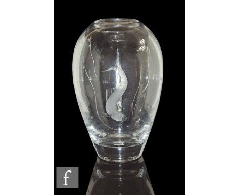 A 20th Century Vicke Lindstrand for Orrefors glass vase of ovoid form, engraved with a fish amongst reeds and bubbles, engrav