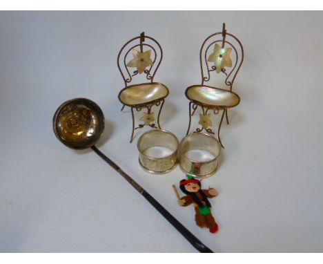 Assorted items to include a toddy ladle inset with George III coin, pr of napkin rings and 2 gilt metal and mother of pearl m