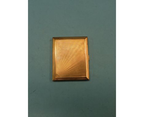 An engine-turned 9ct. gold cigarette case, sunburst-design, London 1929, 140.1 grams SEE ILLUSTRATION