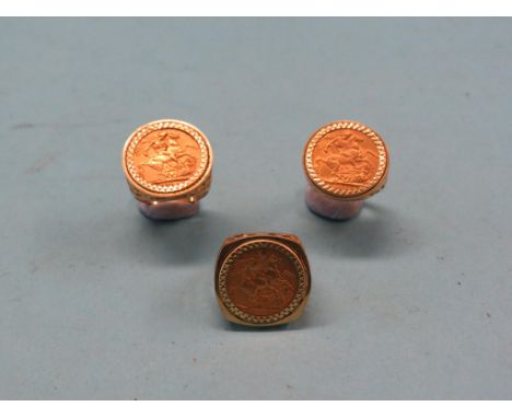 Three gold sovereigns, 1900, 1907, 1911, each within 9ct. gold ring mount