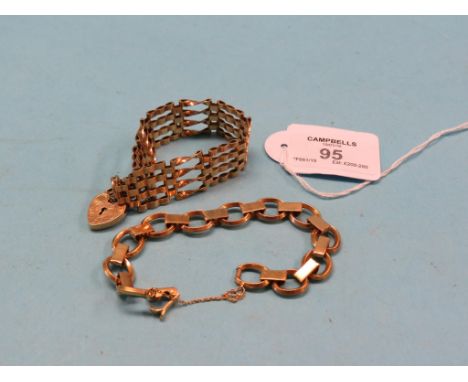 A 9ct. gold gate-link bracelet, with padlock clasp, 20.2 grams, and a yellow metal bracelet, 21 grams