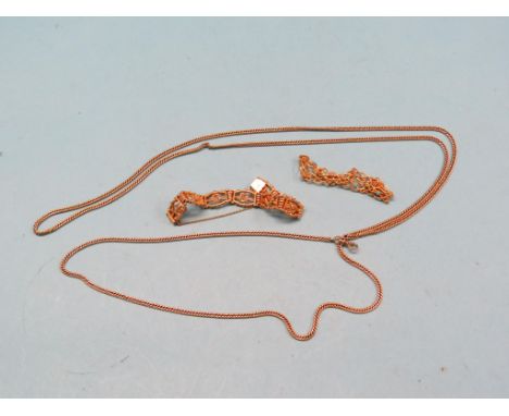 A 15ct. gold bracelet, elaborate gate-link design, 28.1 grams, a 15ct. gold, turquoise and seed pearl bracelet, 14.8 grams, a