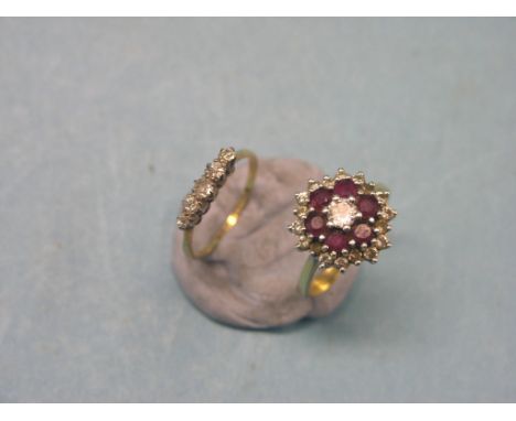 A diamond and ruby cluster ring, claw-setting and 18ct. gold shank, and an 18ct. gold and five-stone diamond half-hoop ring