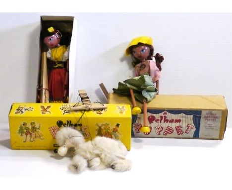 Pelham Puppets, three 1950's-1960's puppets, white poodle with red bow, 'Gypsy Girl' in a white shirt, yellow scarf and red s