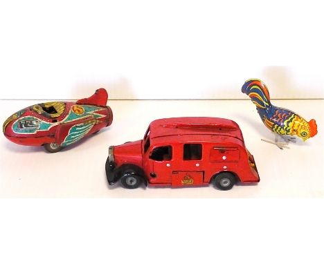 Tri-ang Minic Fire Engine, tinplate with a clockwork mechanism, bright red with black mudguards, missing red plastic ladder, 