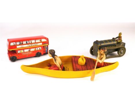 Penguin Indian Boat, two figures seated at the front and back of the boat, one holding an axe, the other an oar, together wit