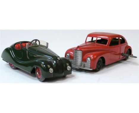 Clockwork Mettoy Saloon Car, no. 810 red tinplate bodywork with green interior with contrasting tinplate interior, solid blac