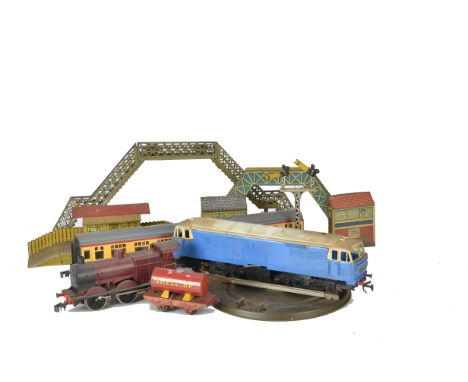 An Accumulation of O Gauge Trains and Accessories by Various Makers, including Tri-ang battery-operated 'Big Big' Hymek and t