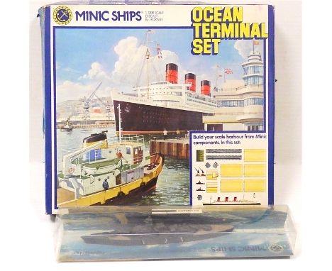 Tri-ang Minic Ships, 1:1200 scale M902 Ocean Terminal Set and a diecast KM Bismark, in original boxes G-VG, boxes P-F (2) 