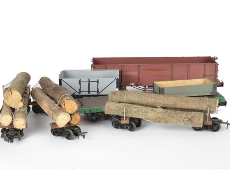 O Gauge (Narrow Gauge) Freight Stock, including 4 bogie lumber wagons with Tri-ang bogies, two others converted from Bachmann