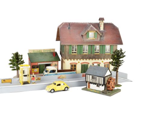 A Large Quantity of G Scale Buildings and Layout Accessories, including station buildings and platforms, engine shed, low-rel