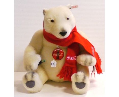 Steiff Coca-Cola Teddy Bear, white label, reference 670336, no. 5560 of 10000, white mohair fur, grey suede paws, brown glass