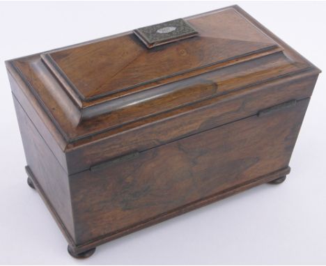 A Victorian rosewood sarcophagus shaped tea caddy,with inlaid brass & mother of pearl scroll marquetry, fitted inner caddies 