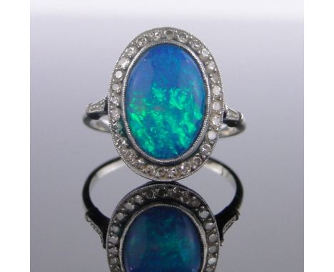 Art Deco 18 ct white gold black opal & diamond set panel ring,small diamond set shoulders, panel height 19 mm, size Q