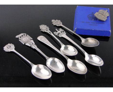 Group of regimental souvenir teaspoons,& a boxed A R P badge with papers