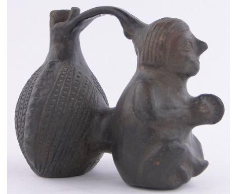 An ancient Peruvian / pre Columbian ceramic double gourd vessel,height 5.5 "