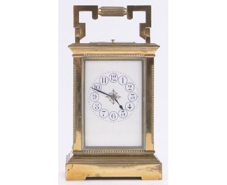 A French brass cased carriage clock with striking movement,case height 5.75"