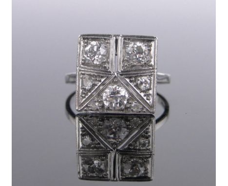 A Platinum diamond set panel ring,setting width 15 mm, size R, old European cut, colour approx F-G on average, clarity approx