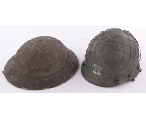 A Second War period British Army helmet with gas curtain,& one other helmet (2)