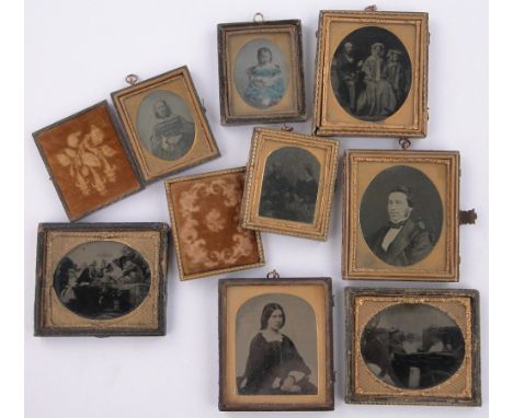 A group of Victorian Dageurrotype & silver print portrait photographs,in leather frames (8)