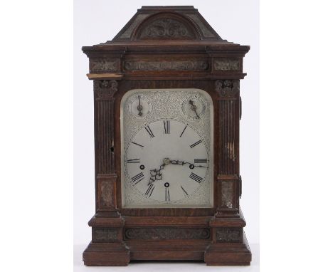 A 19th century carved oak cased architectural bracket clock,engraved silvered dial & 3 train chiming movement, height 19"