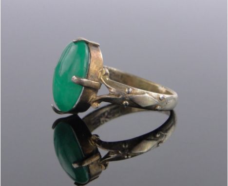A Chinese gold jade set ring,jade panel height 12 mm with Chinese marks, size M