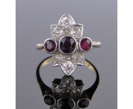 An 18 ct gold & platinum ruby & diamond set panel ring,panel height 18 mm, size M