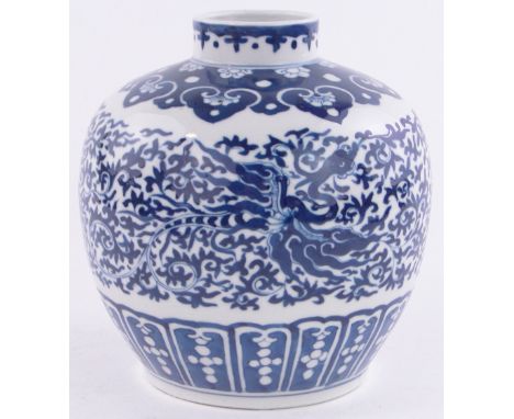 A Chinese blue & white porcelain jar,painted dragon designs, 6 character mark under, height 8.25" rim diameter 2.75"