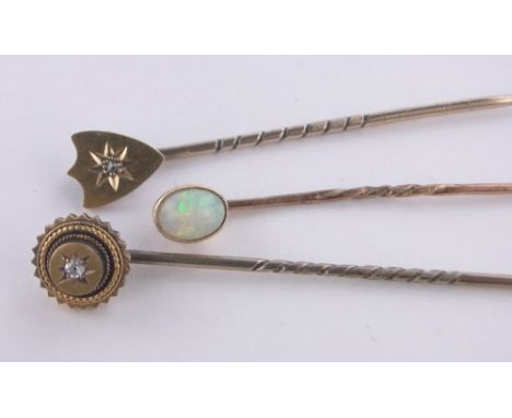 2 diamond set gold tiepins,& an opal set tiepin (30