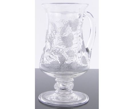 A Victorian glass celery jar with etched grapevine design,dated 1880, height 7.25"