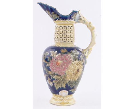 A Zsolnay porcelain ewer with reticulated neck,& painted & gilded chrysanthemum designs, height 9.5"