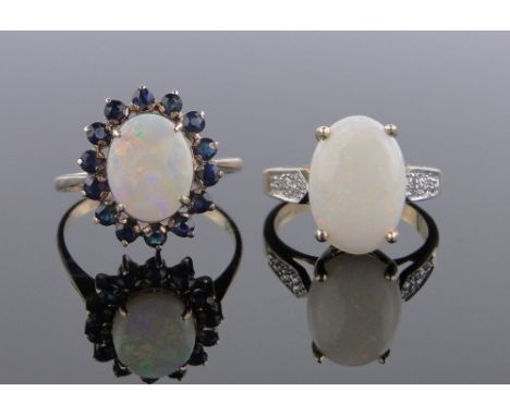 A 9 ct gold opal & sapphire cluster ring,setting height 15 mm, size T & a 9 ct opal ring with diamond set shoulders (2)