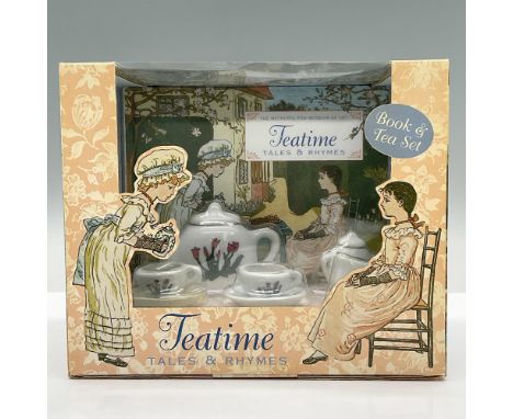 This is a well preserved, brand new, featuring the book, Teatime Tales and Rhymes, and a small porcelain tea set by the Metro