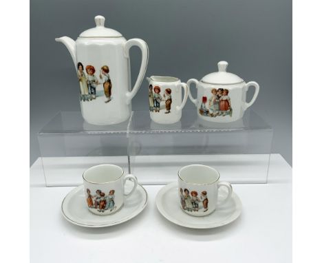 Charming porcelain collection decorated with images of young children playing instruments that consists of a tea pitcher 6.25
