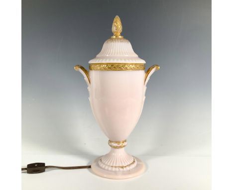 Beautiful pink gilded glass lamp with ridged lid. Shaped like a Grecian urn. Comes with brown electrical cord. Issued: 1932-1