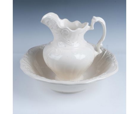 Gorgeous pair of home decor that includes a beautiful waved edge pitcher, and a large serving bowl with floral decor. Liz 83 