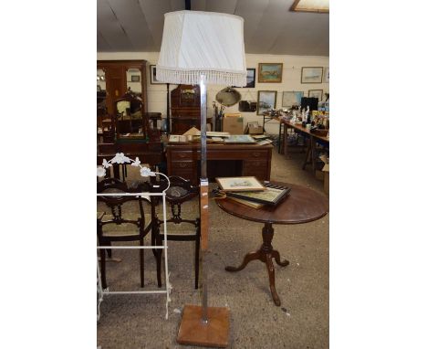 An Art Deco style chrome and walnut veneered standard lamp, requiring re-wiring