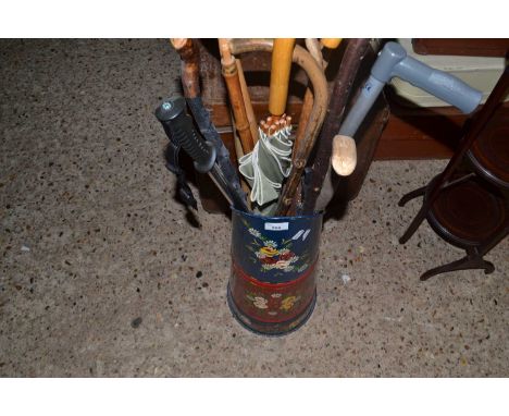 Barge ware type painted coal hopper containing various walking sticks