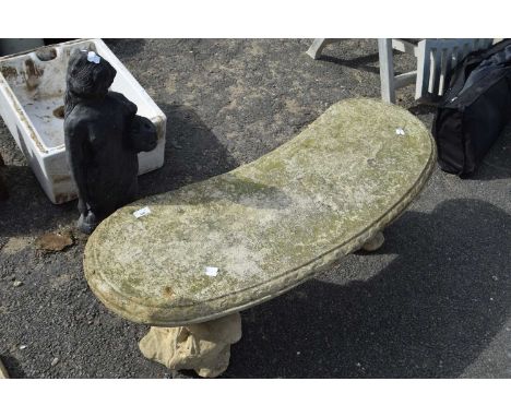 Reconstituted stone curved garden bench and a figure of a lady