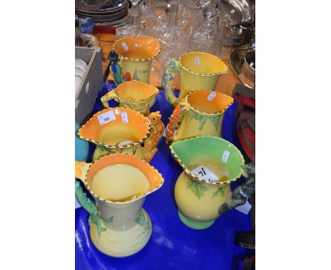 Collection of seven various Burleigh ware Art Deco jugs with floral and animal handles