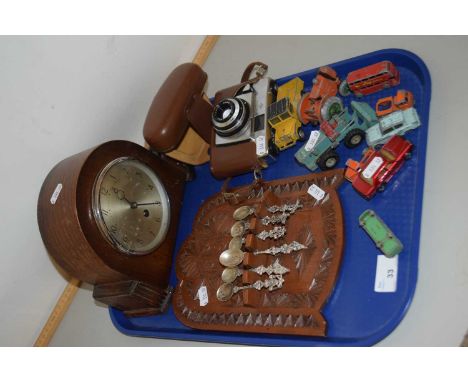 Mixed Lot: Mantel clock, various toy cars, vintage camera, collection of Dutch spoons in a display rack