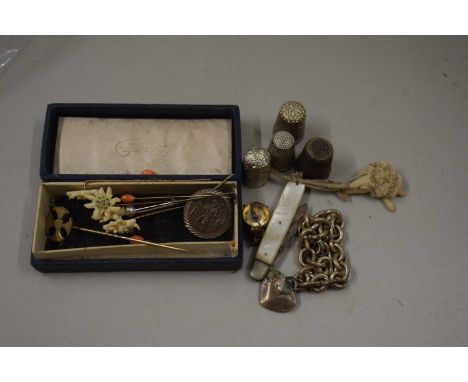 Thimbles, coral pins etc