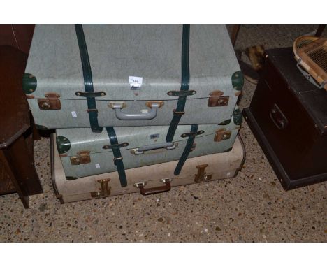 Three vintage suitcases