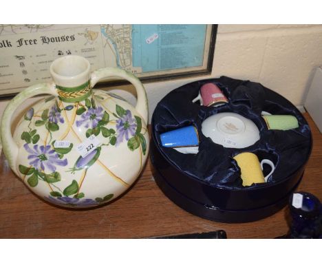 Modern floral pattern double handled vase together with a cased modern Royal Worcester set of coffee cups and saucers