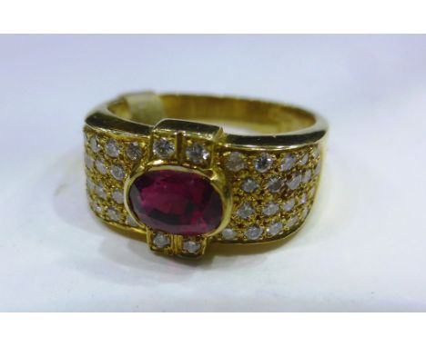 An 18ct yellow gold, ruby and diamond ring (size L)