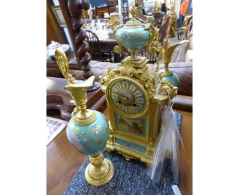 A 19th century French ormolu and porcelain three piece mantel clock garniture, with Japy Freres 8 day movement, striking the 